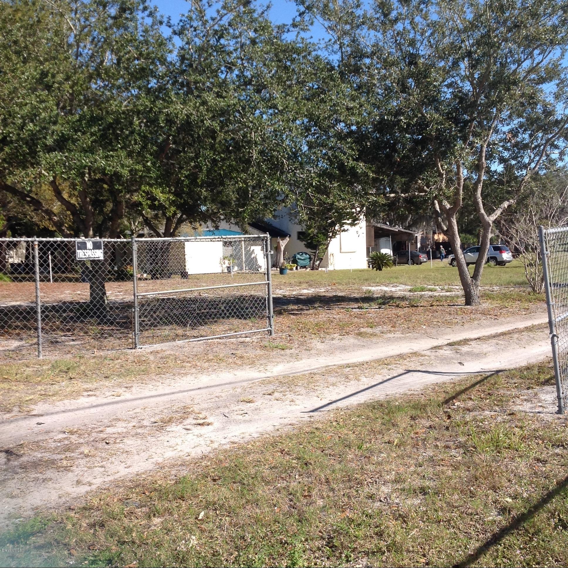 922 Clearlake Road Cocoa, FL 32922 - Photo 26 of 31 a view of a yard with large trees