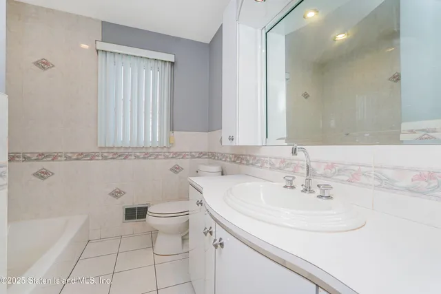 $749,999 | 276 Fairbanks Avenue | Oakwood Beach