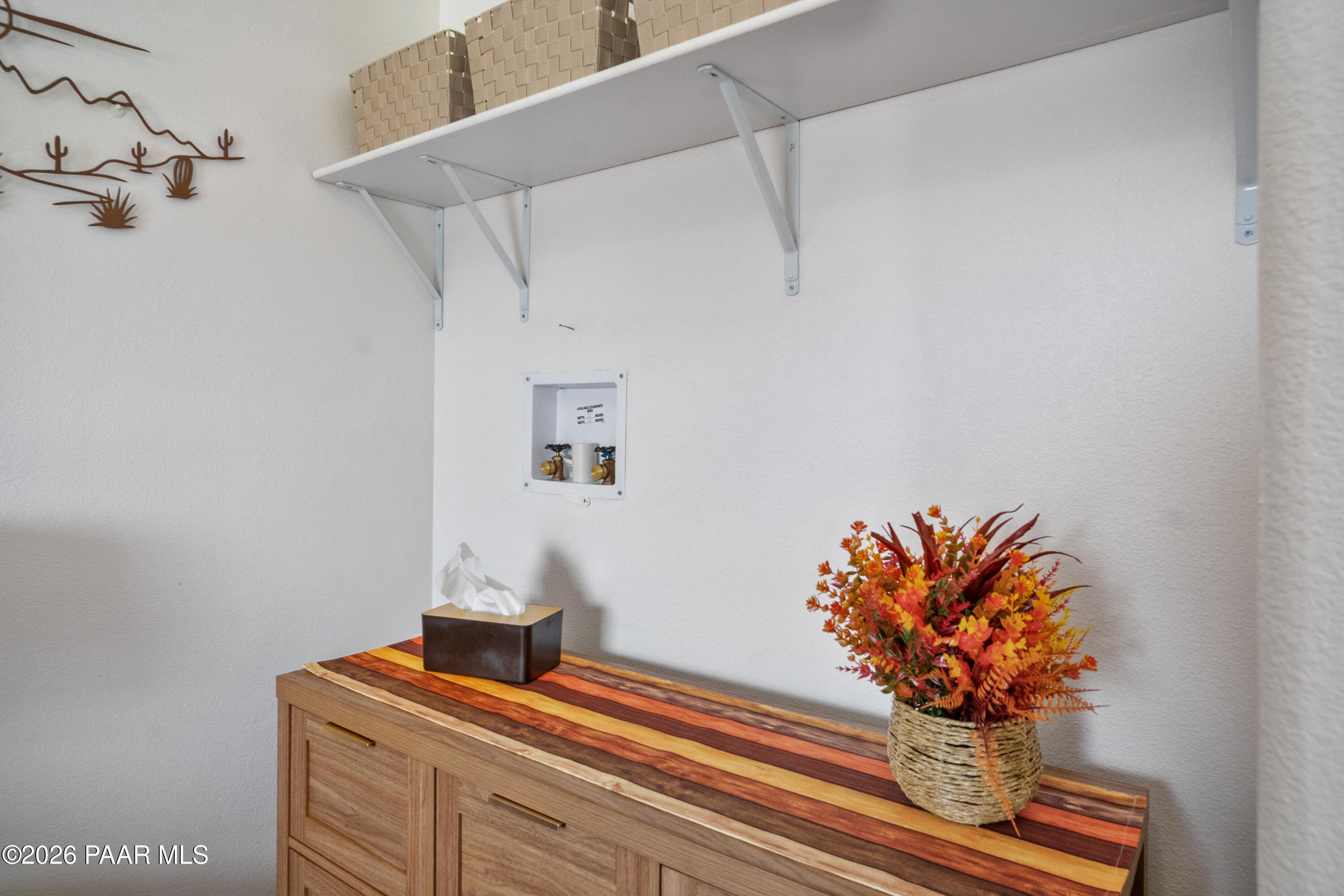 25815 Fort Rock Road Seligman, AZ 86337 - Photo 13 of 30 a vase of flowers sitting on a table