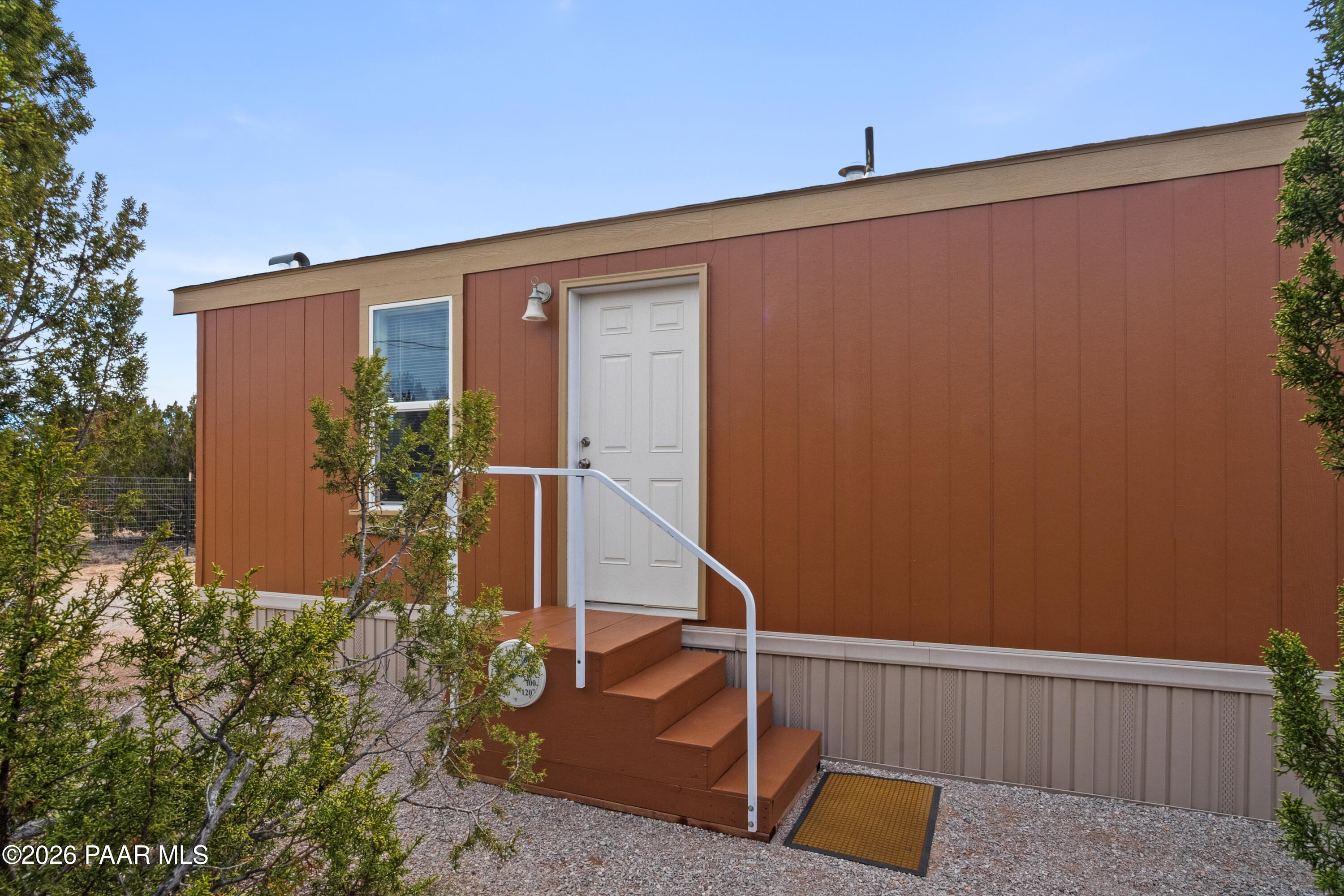 25815 Fort Rock Road Seligman, AZ 86337 - Photo 2 of 30 front view of a house with a large window
