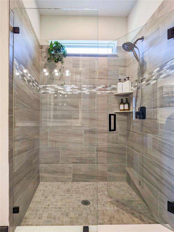 3324 Big Sky Way Lakewood Ranch, FL 34211 - Photo 13 of 49 a bathroom with a shower