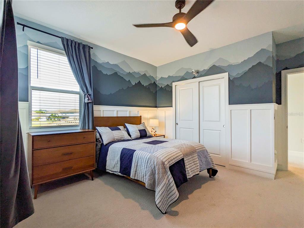 3324 Big Sky Way Lakewood Ranch, FL 34211 - Photo 21 of 49 a bed room with a bed and a window