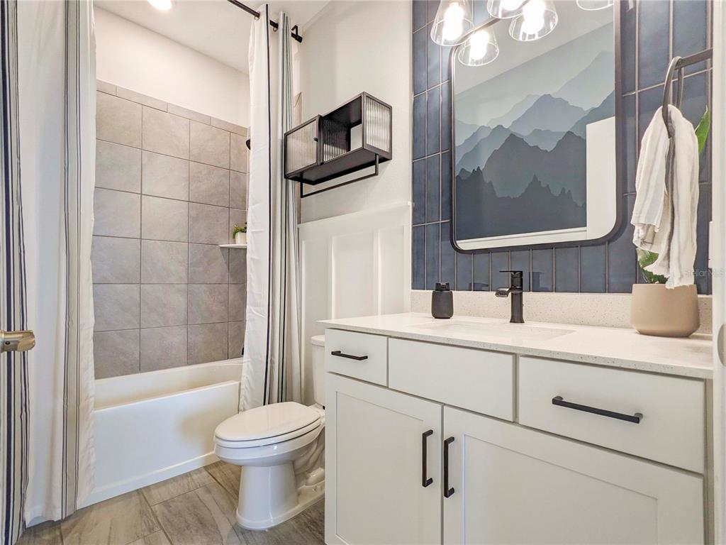 3324 Big Sky Way Lakewood Ranch, FL 34211 - Photo 22 of 49 a bathroom with a sink a toilet and shower