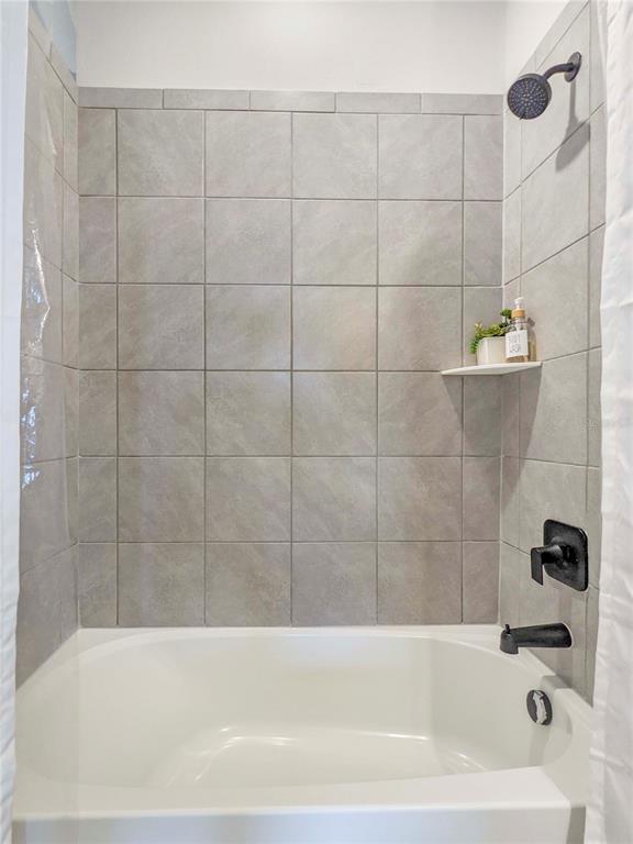 3324 Big Sky Way Lakewood Ranch, FL 34211 - Photo 23 of 49 a bathroom with a bathtub