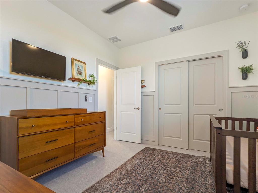 3324 Big Sky Way Lakewood Ranch, FL 34211 - Photo 27 of 49 a room with furniture and a flat screen tv