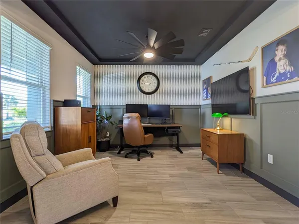 a living room with furniture and a table