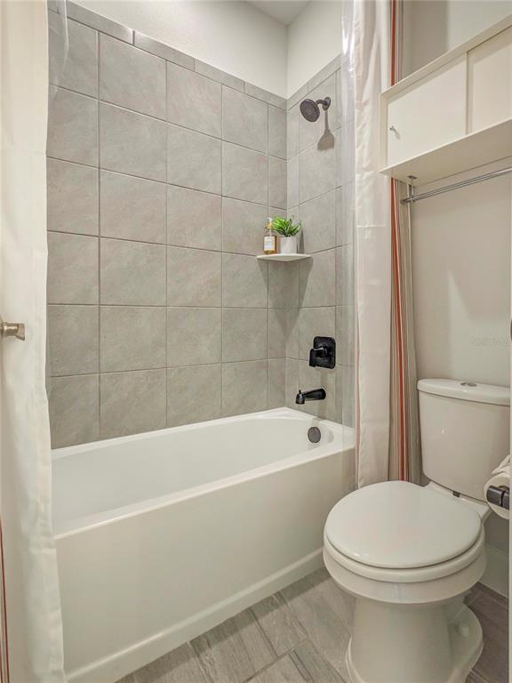 3324 Big Sky Way Lakewood Ranch, FL 34211 - Photo 32 of 49 a bathroom with a toilet bathtub and shower
