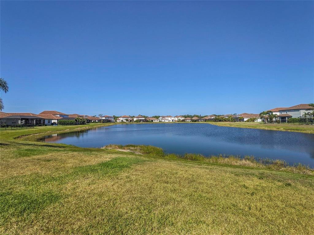 3324 Big Sky Way Lakewood Ranch, FL 34211 - Photo 34 of 49 a view of swimming pool with an ocean view