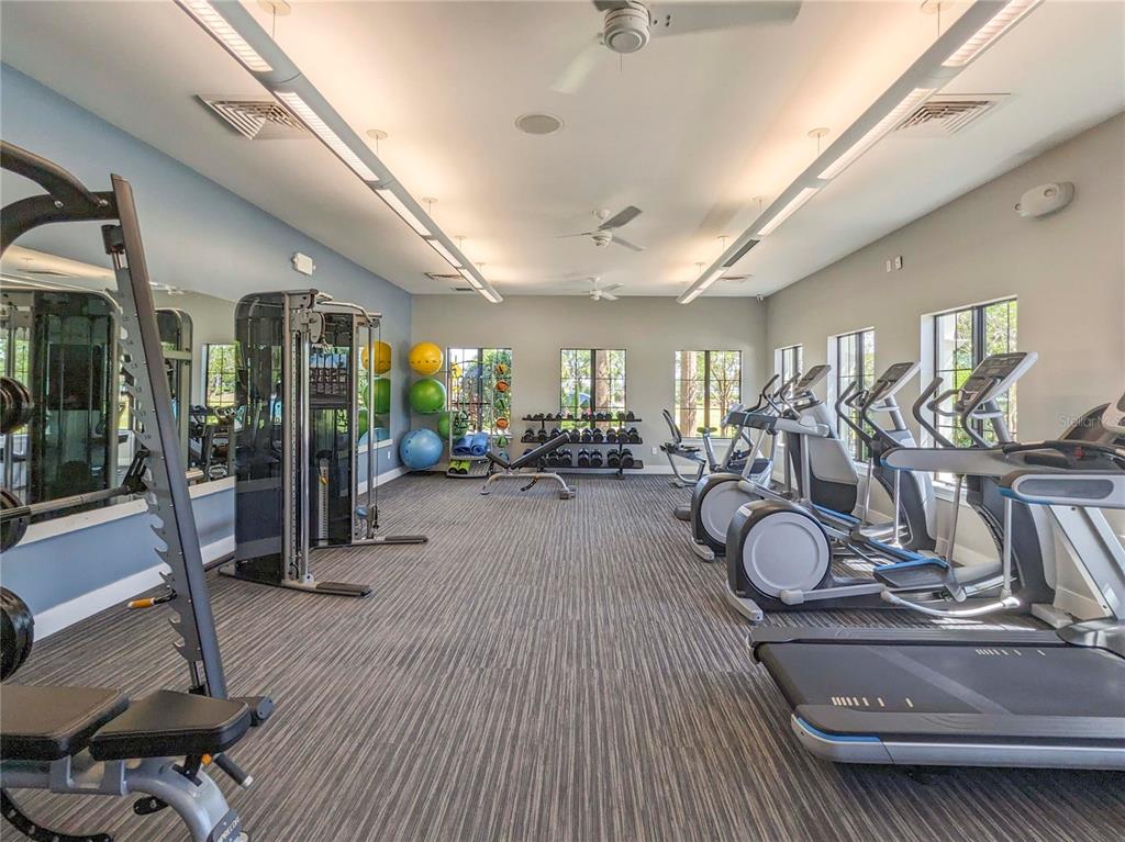 3324 Big Sky Way Lakewood Ranch, FL 34211 - Photo 40 of 49 a lobby with furniture and a wooden floor