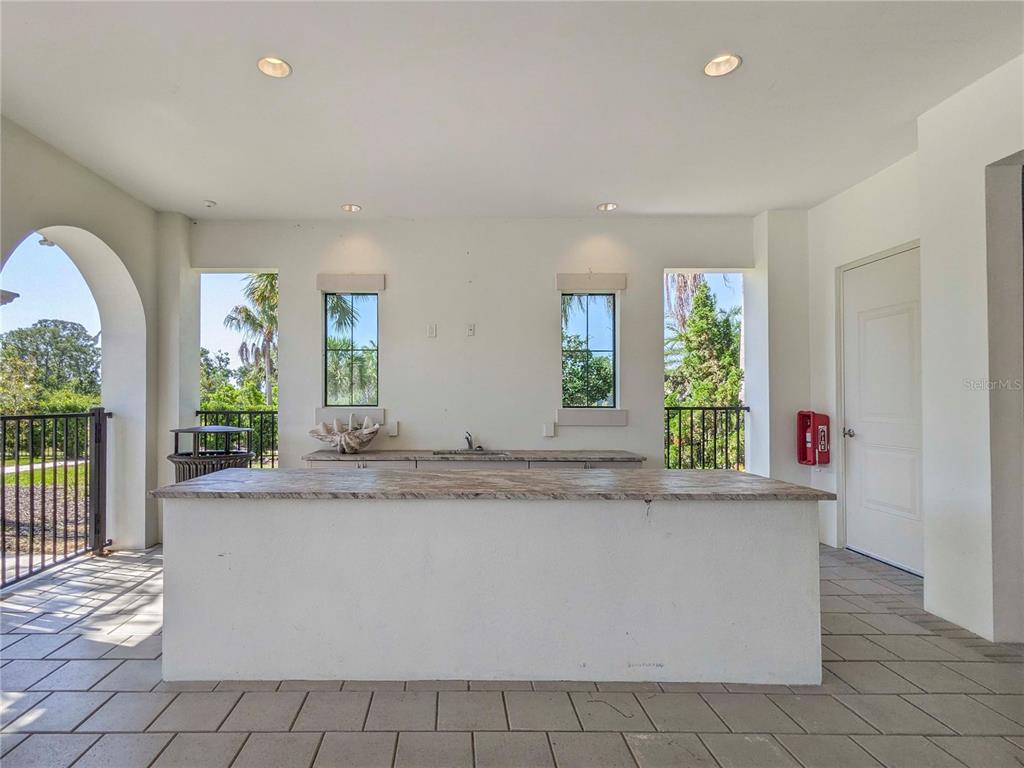 3324 Big Sky Way Lakewood Ranch, FL 34211 - Photo 45 of 49 a view of a living room a window and a kitchen