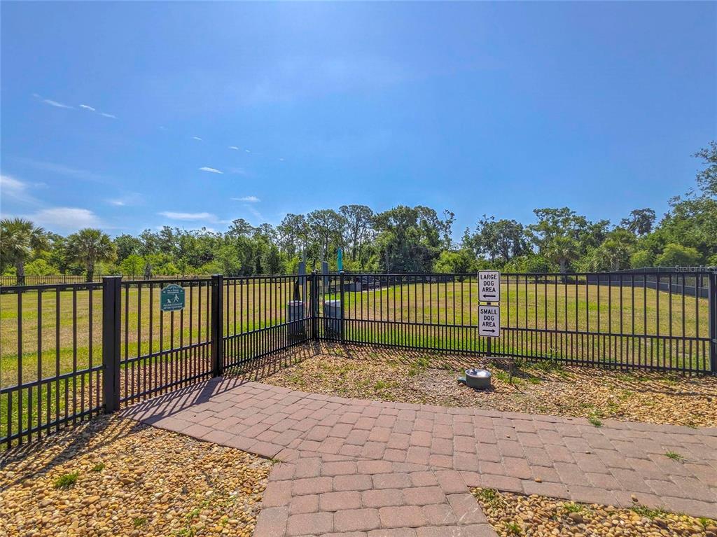 3324 Big Sky Way Lakewood Ranch, FL 34211 - Photo 48 of 49 a garden view with a lake view