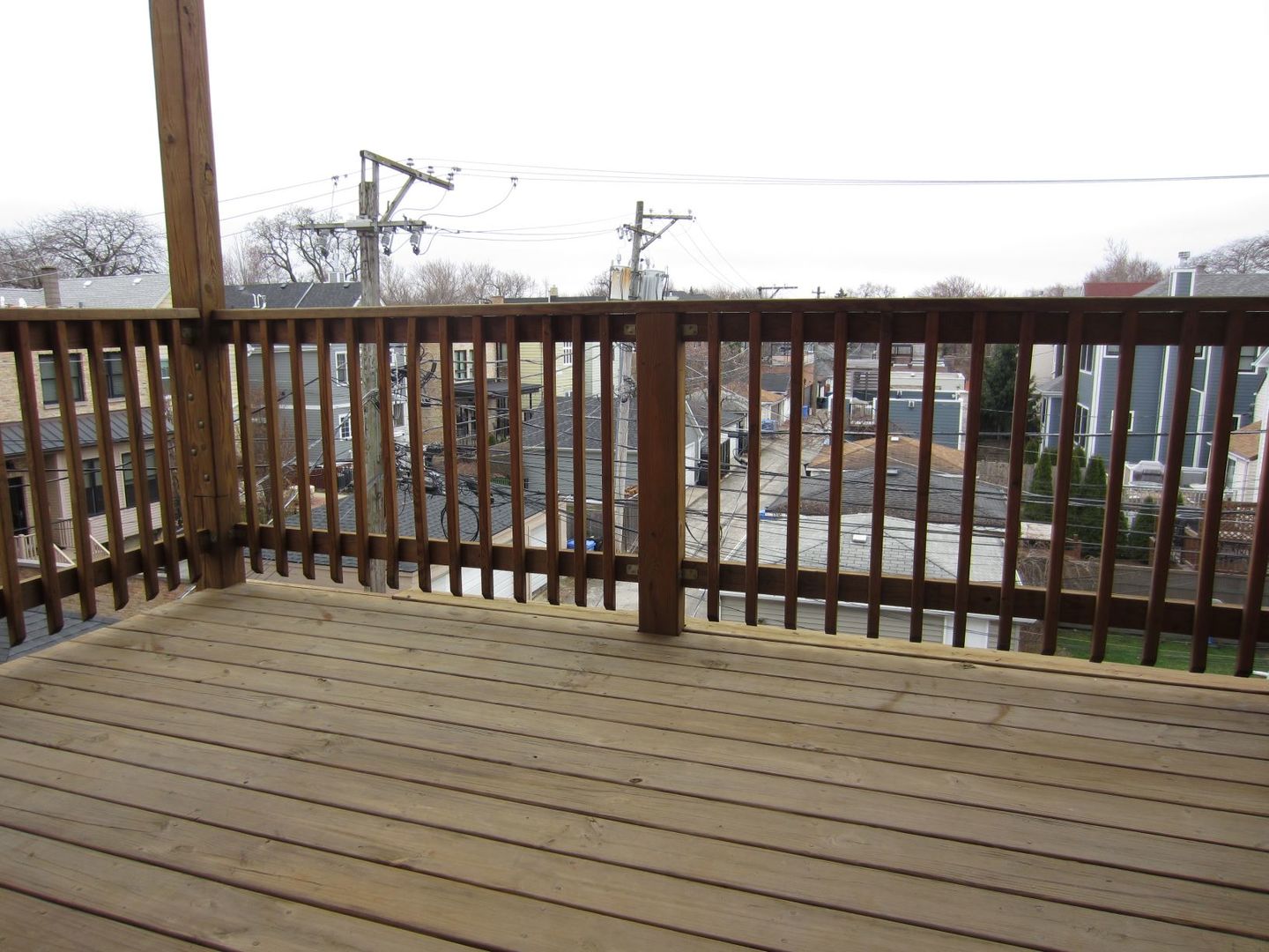 2117 West Irving Park Road, Unit 3R Chicago, IL 60618 - Photo 9 of 10 a view of wooden balcony