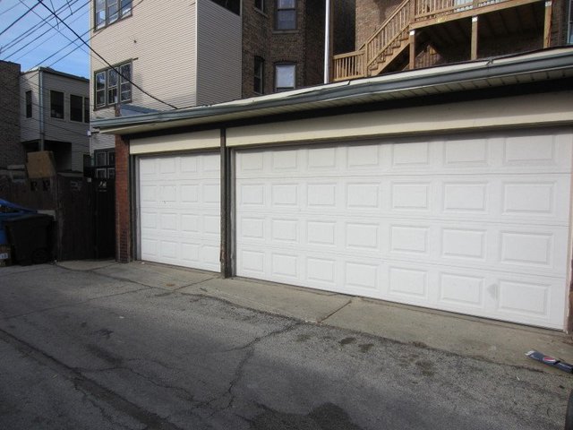2117 West Irving Park Road, Unit 3R Chicago, IL 60618 - Photo 10 of 10 a view of a house with a garage