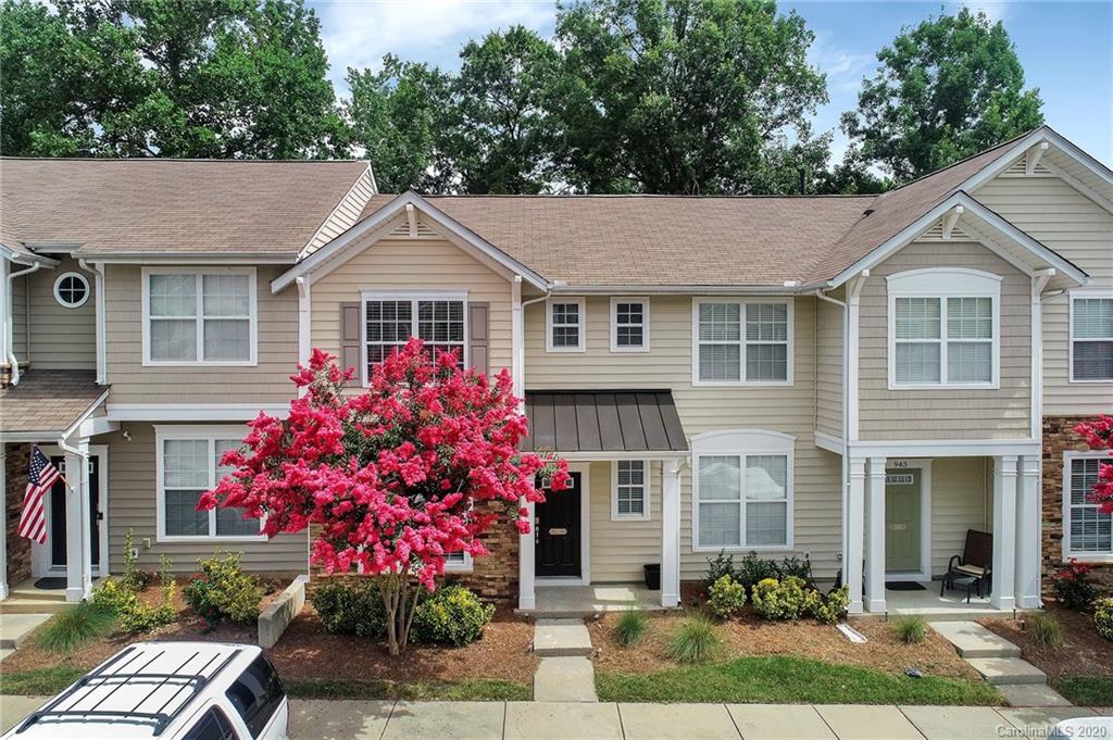 941 Copperstone Lane Fort Mill, SC 29708 - Photo 1 of 17 a front view of a house with a yard and potted plants