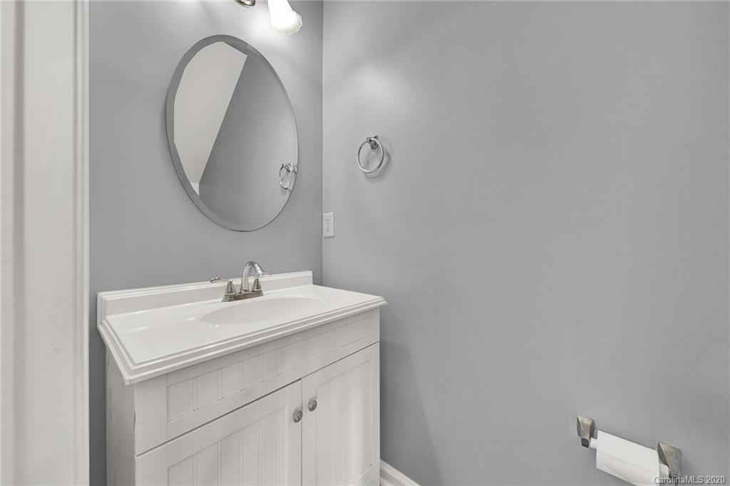 941 Copperstone Lane Fort Mill, SC 29708 - Photo 5 of 17 a bathroom with a sink and a mirror