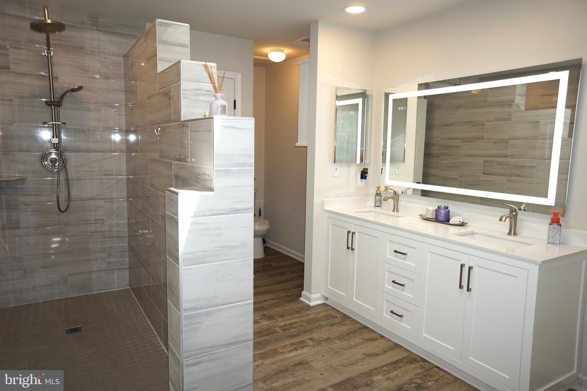 27 Appling Road Stafford, VA 22554 - Photo 51 of 79 Dual sinks in primary with light up/defog mirror