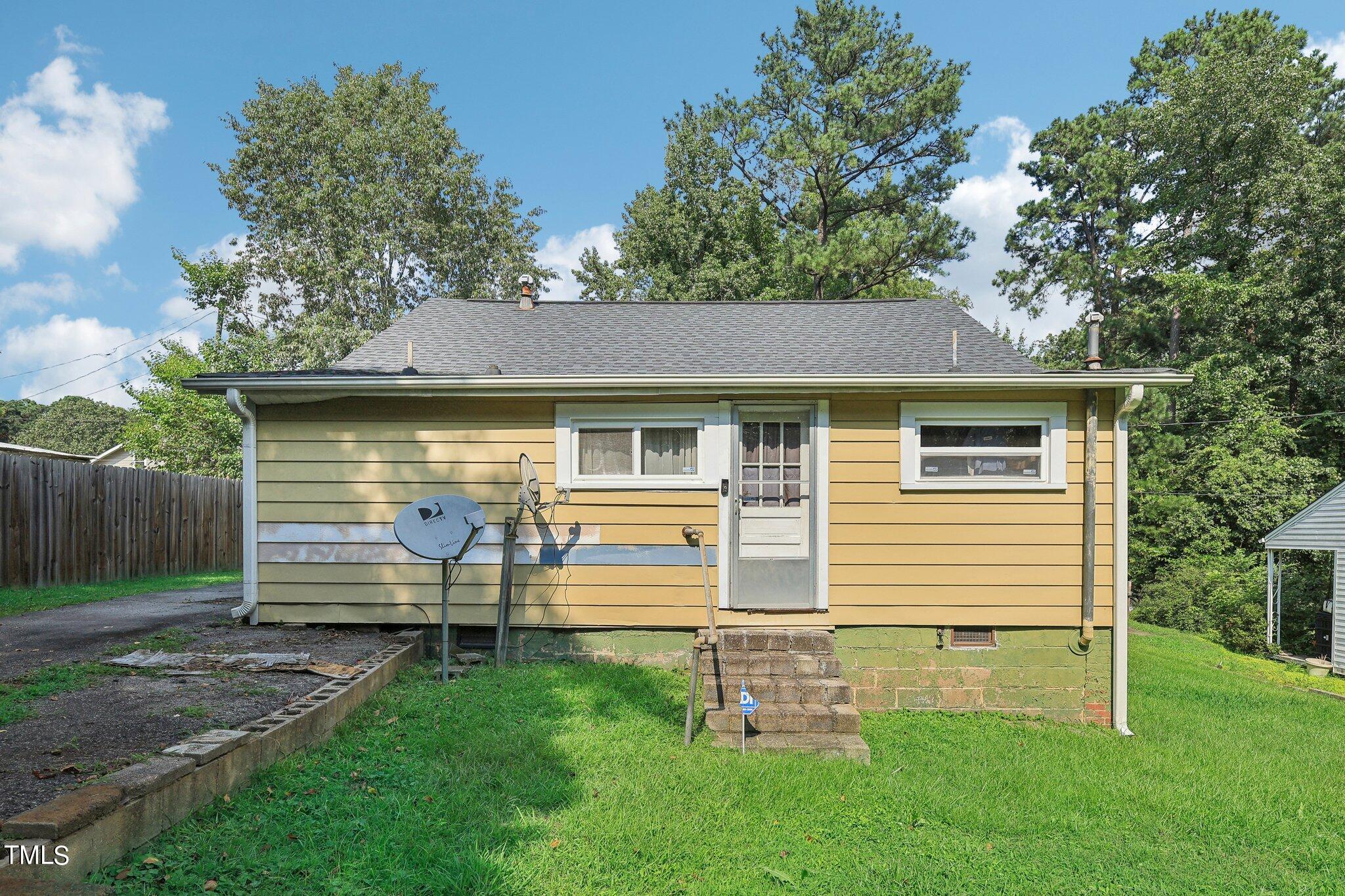 2917 State Street Durham, NC 27704 - Photo 19 of 22 a front view of a house with a yard