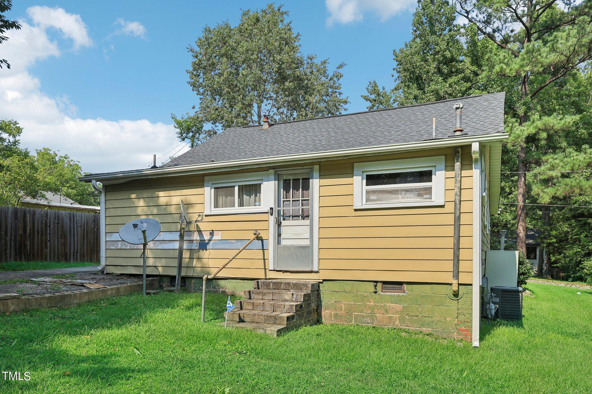 2917 State Street Durham, NC 27704 - Photo 20 of 22 a view of a house with a backyard