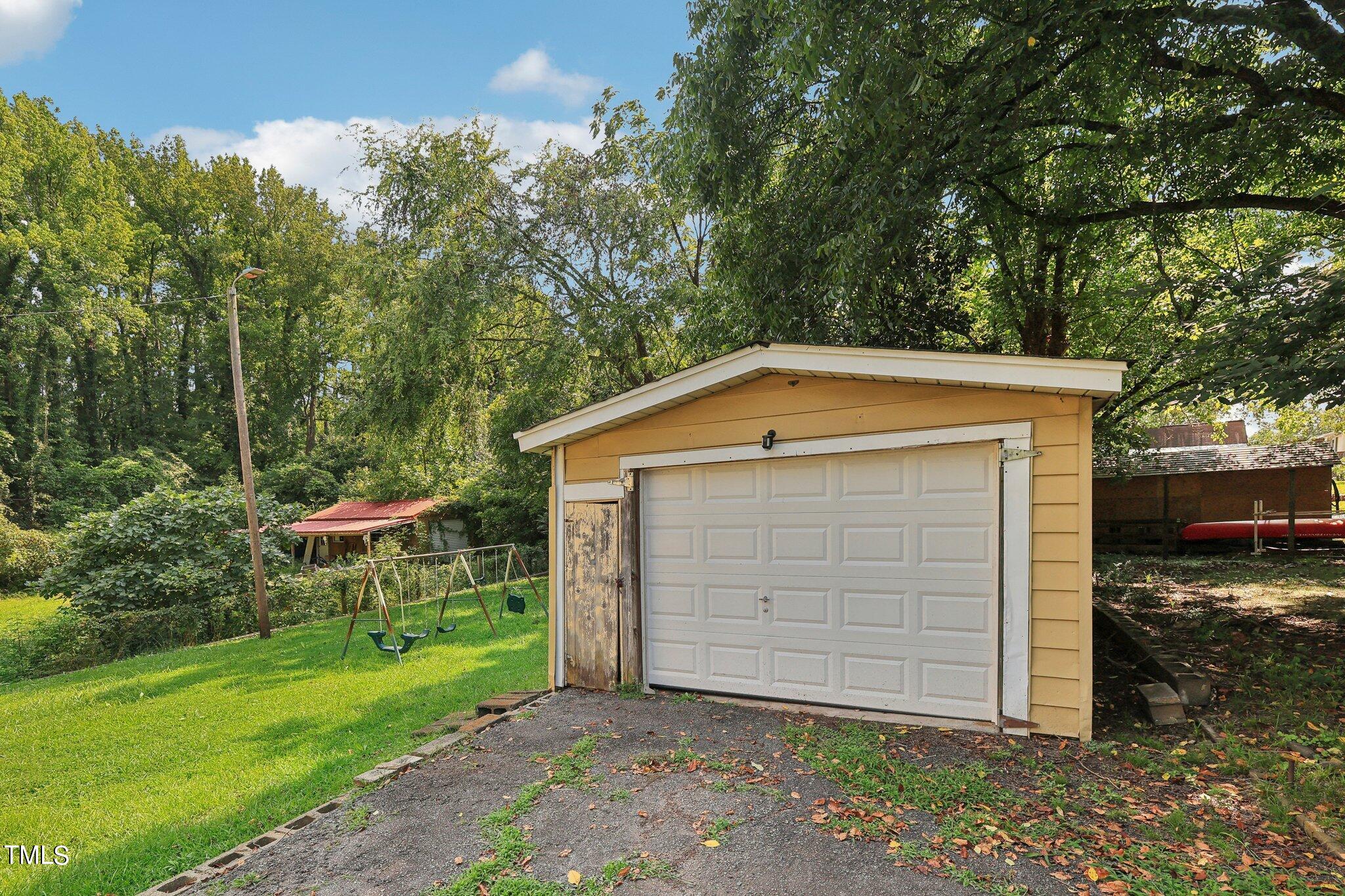 2917 State Street Durham, NC 27704 - Photo 21 of 22 a front view of a house with a yard