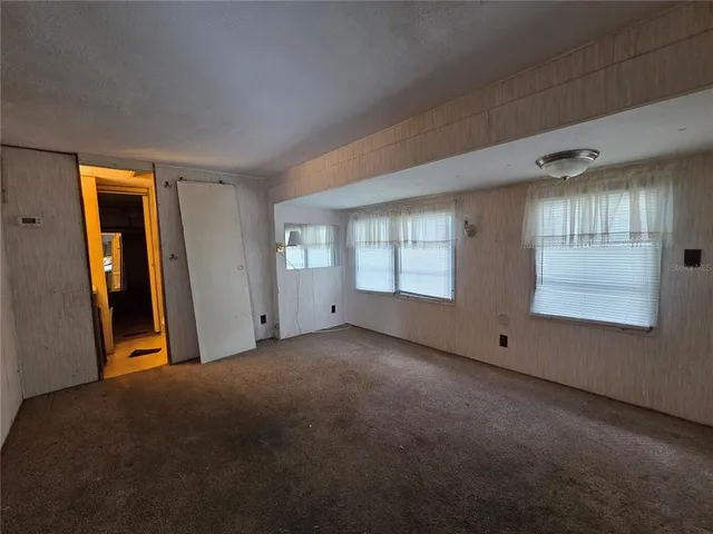a bathroom with a toilet and a bathtub