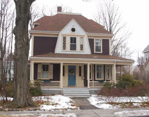 18 Warwick Road Newton, MA 02465 - Photo 1 of 1 a front view of a house with a yard
