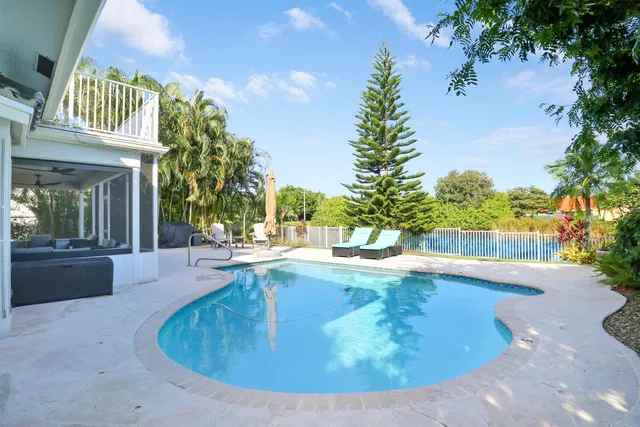 a view of a house with swimming pool