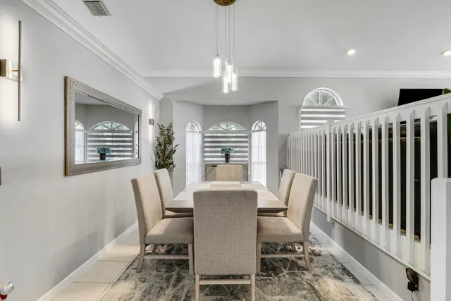 a view of a dining room with furniture