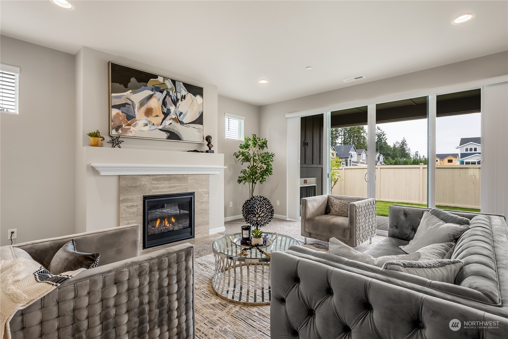 3040 Stephanie Loop Northeast Lacey, WA 98516 - Photo 12 of 14 a living room with furniture and a fireplace