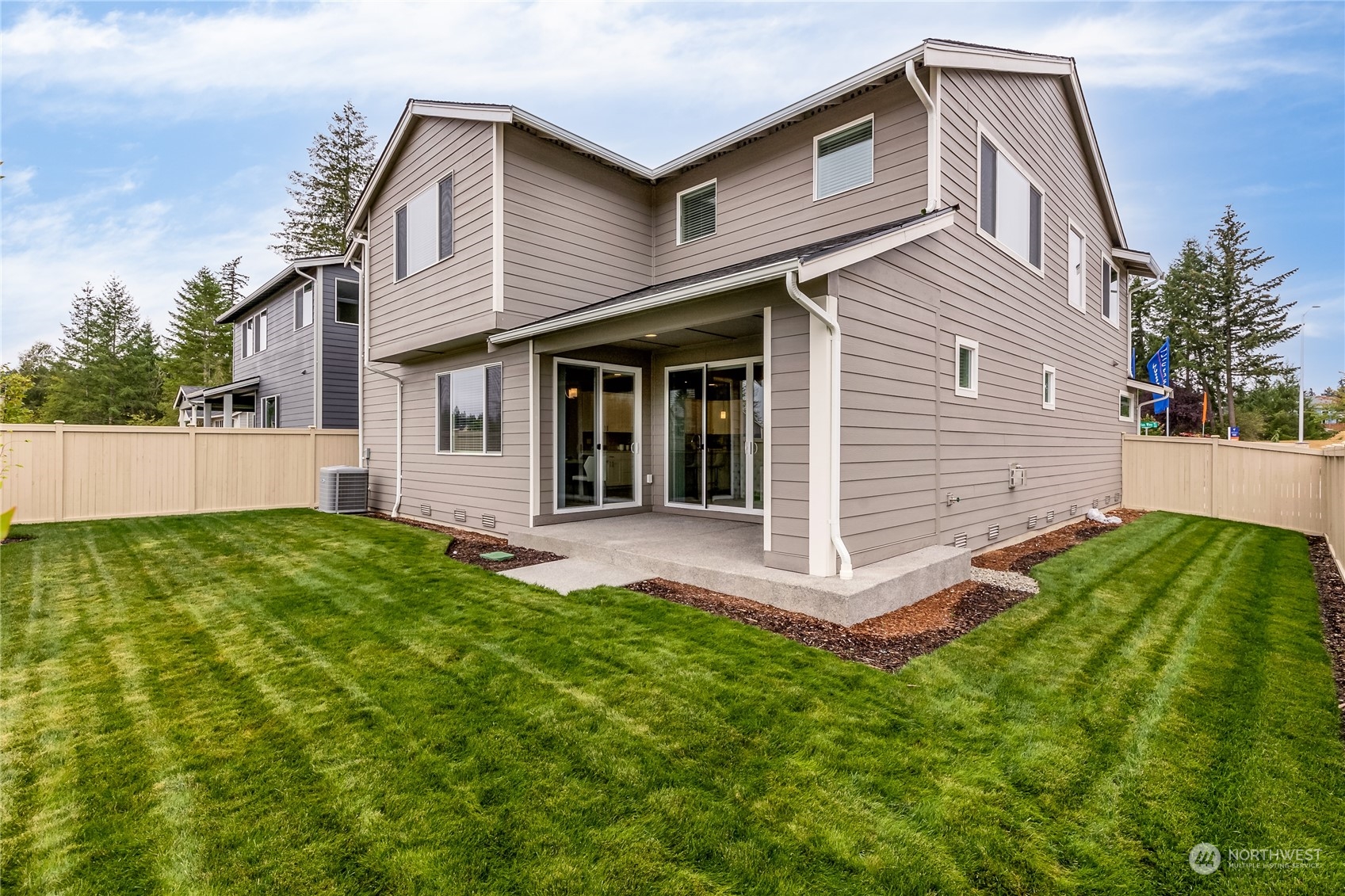 3040 Stephanie Loop Northeast Lacey, WA 98516 - Photo 14 of 14 a front view of a house with a yard