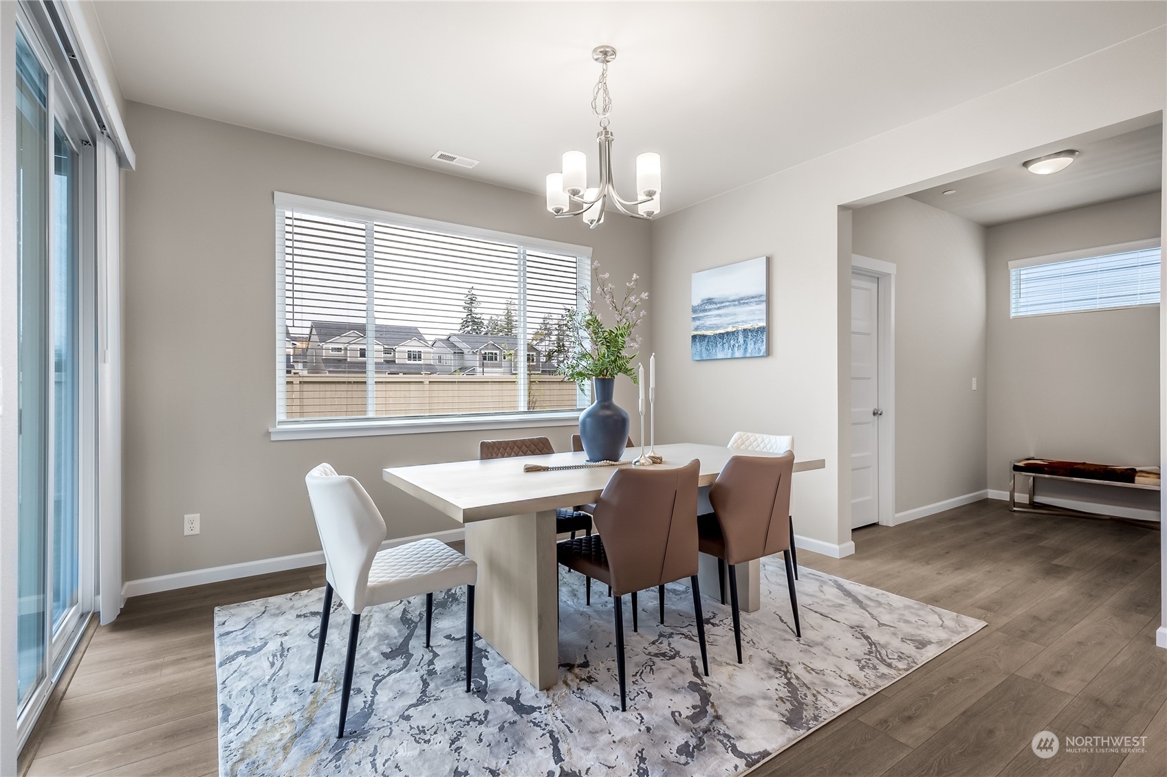 3040 Stephanie Loop Northeast Lacey, WA 98516 - Photo 6 of 14 a view of a dining room with furniture window and wooden floor