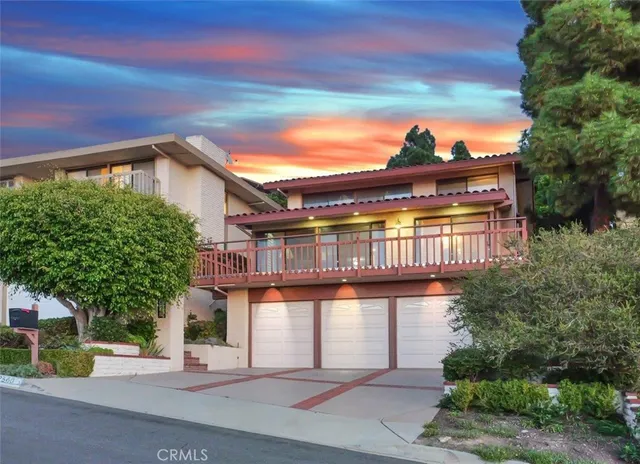 a view of a building with a yard