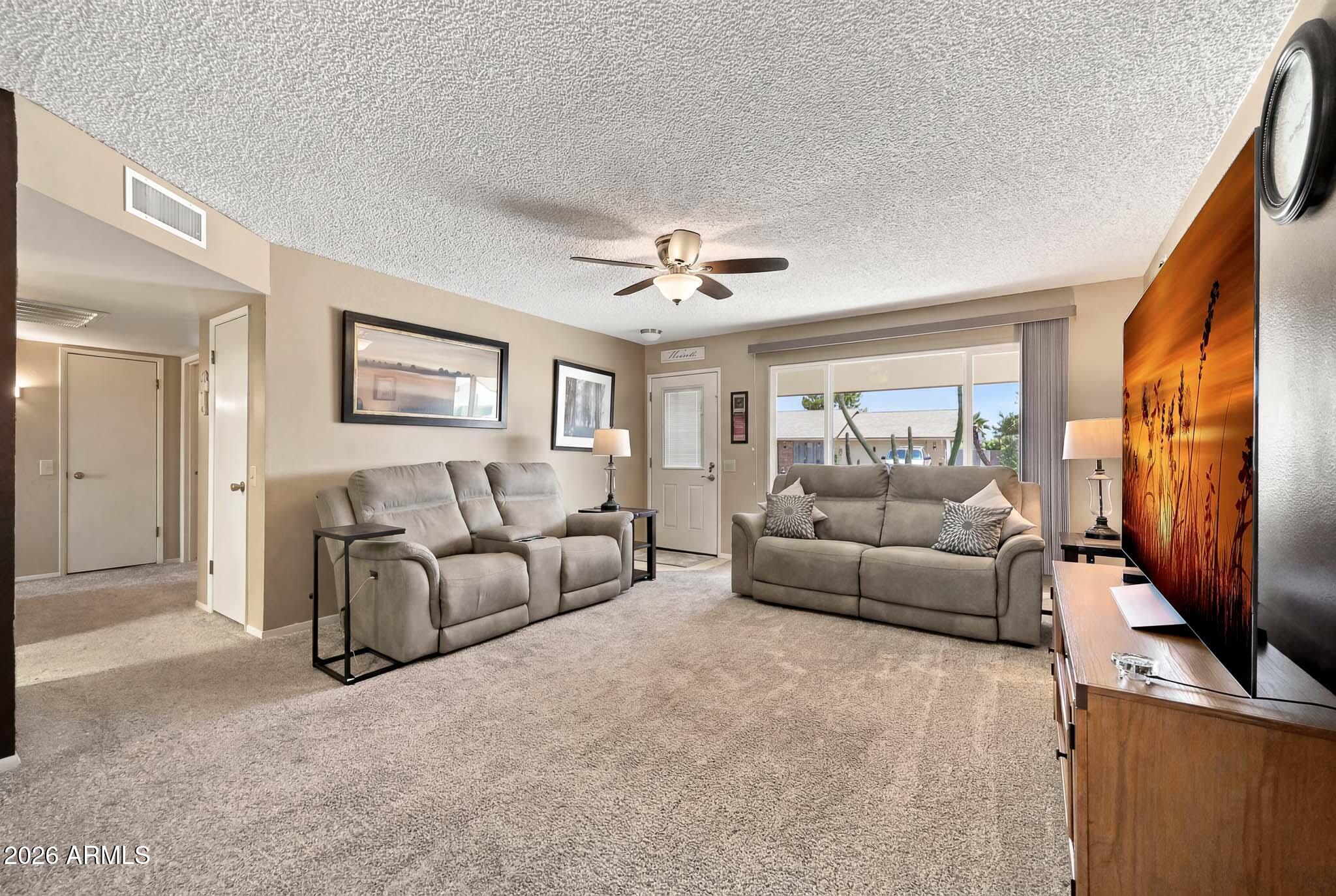 9810 West Blue Ridge Drive Sun City, AZ 85351 - Photo 9 of 29 Living Room
