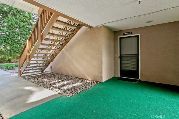 a view of an entryway with a garden