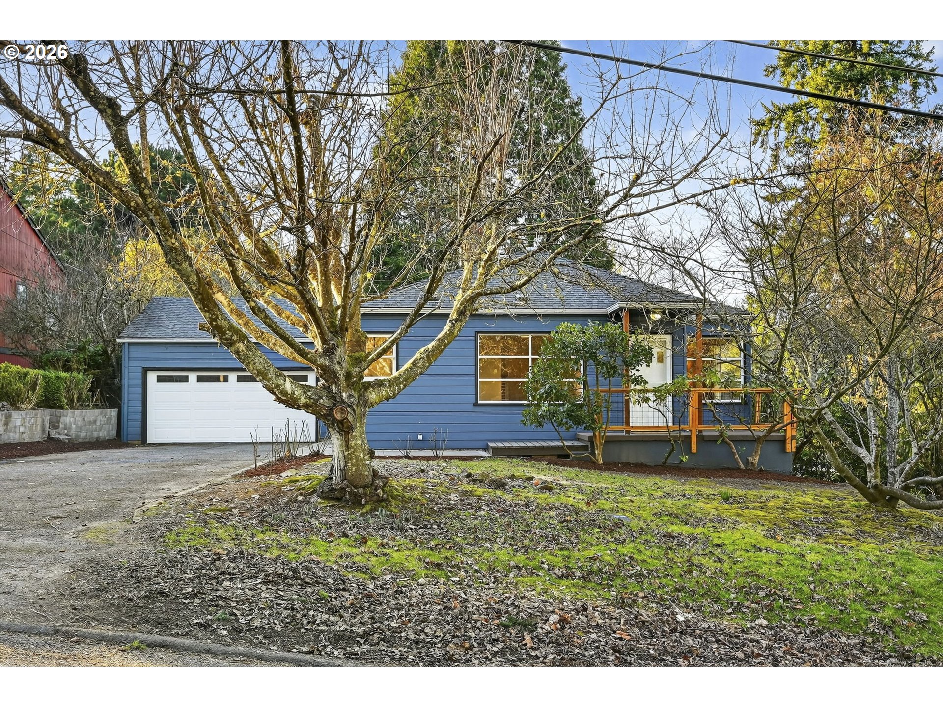 front view of a house with a yard