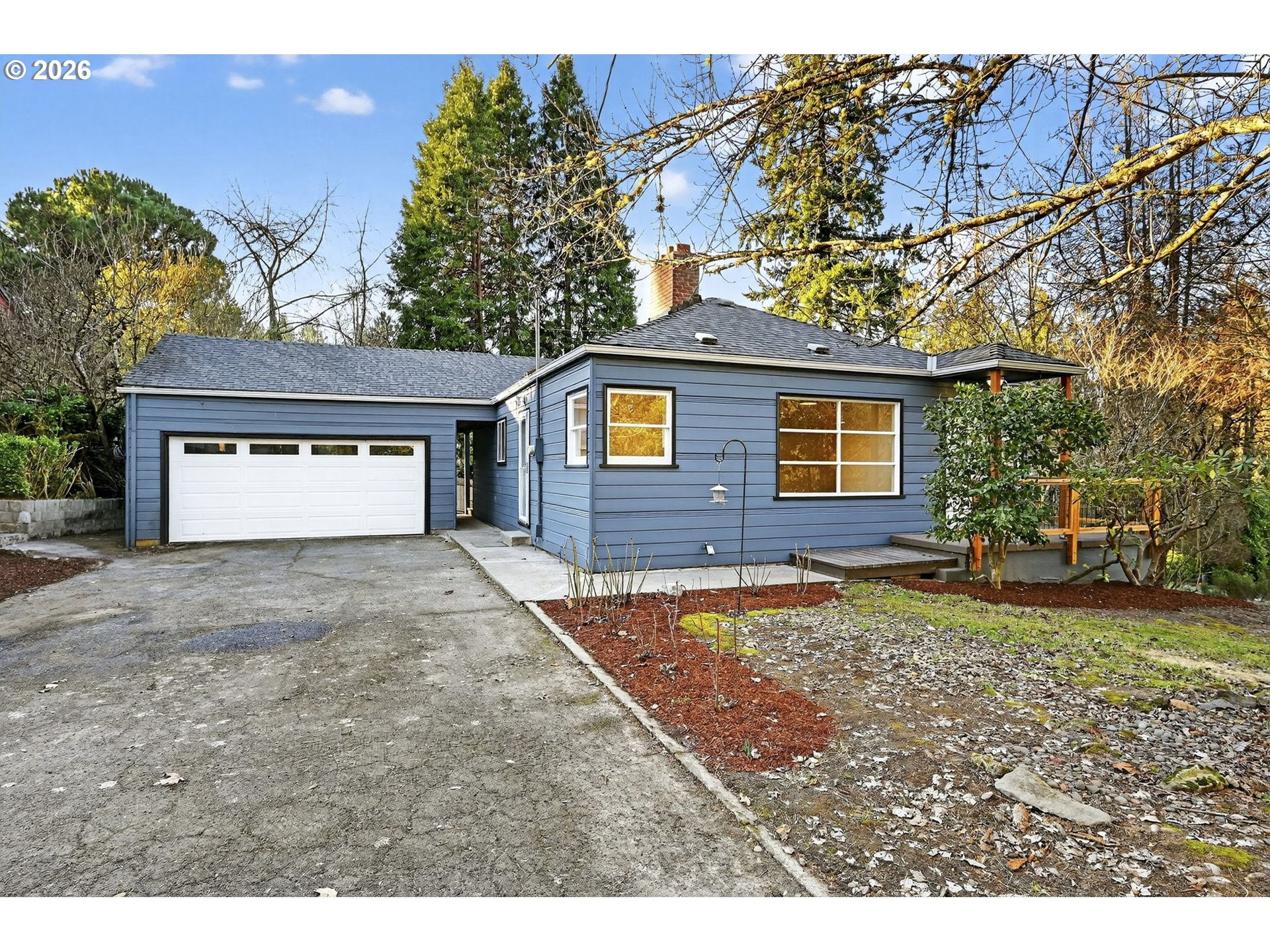 11811 Southwest 34th Avenue Portland, OR 97219 - Photo 2 of 39 a house view with a outdoor space