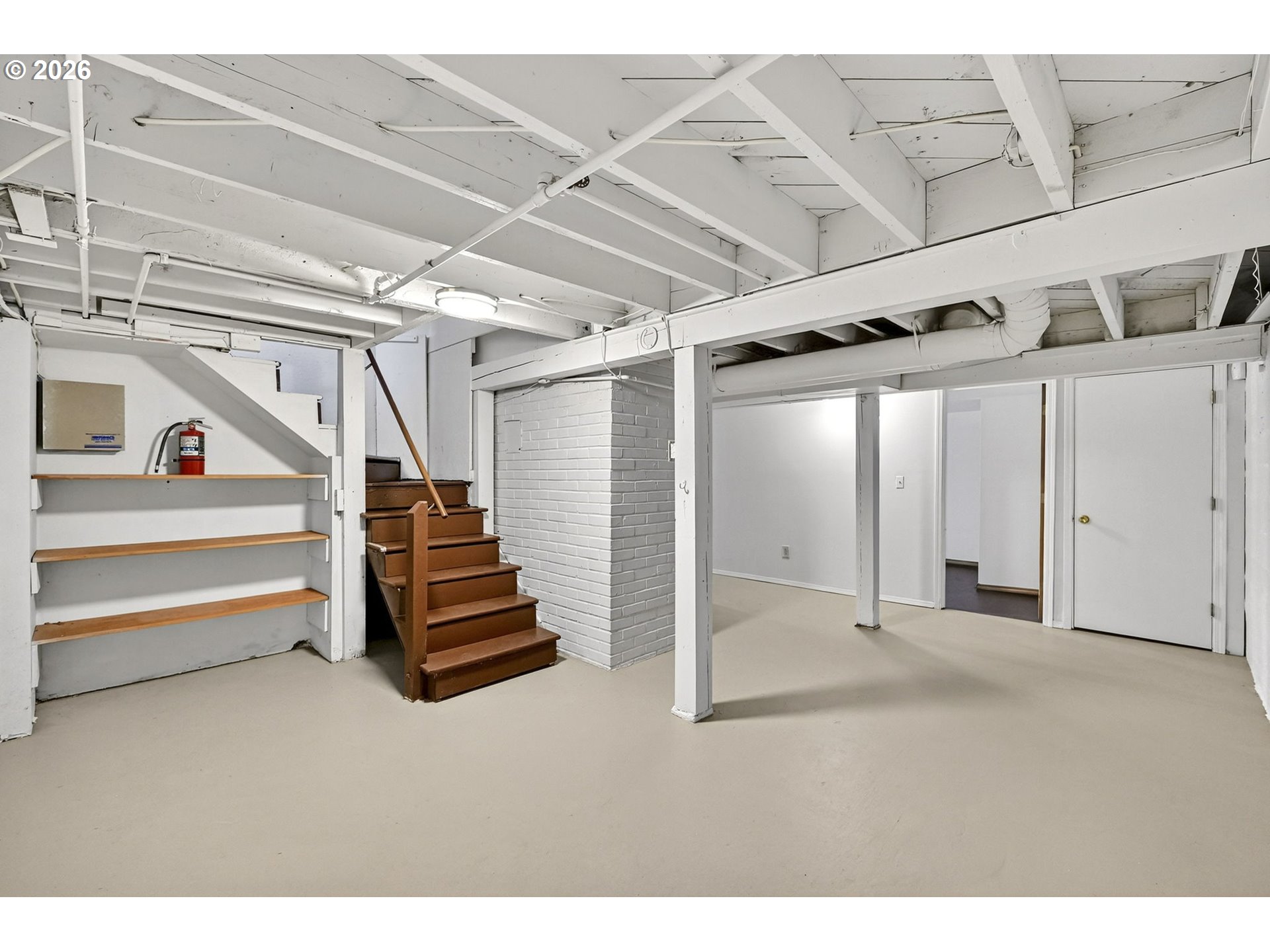 11811 Southwest 34th Avenue Portland, OR 97219 - Photo 22 of 39 a view of an empty room with stairs