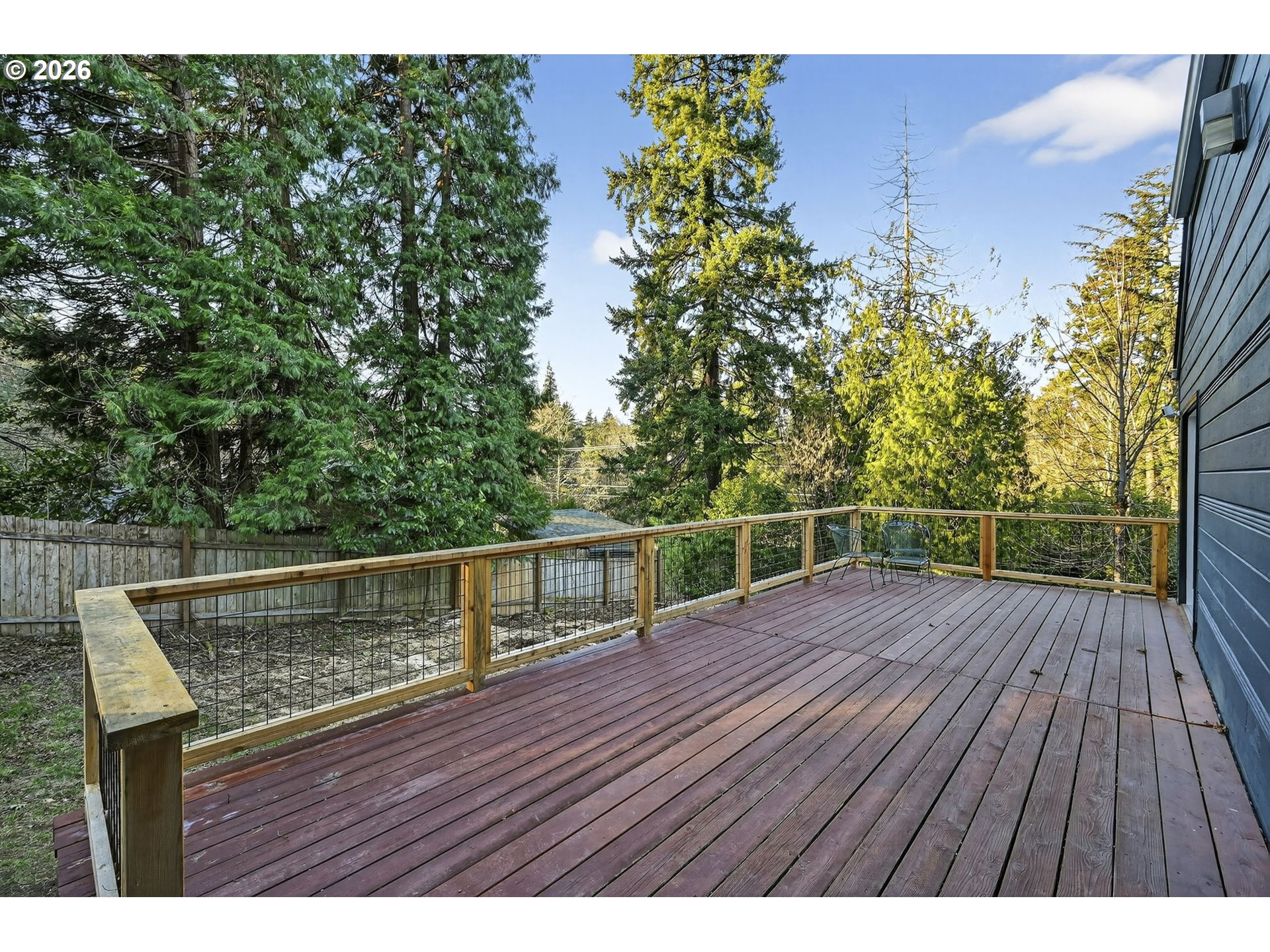 11811 Southwest 34th Avenue Portland, OR 97219 - Photo 30 of 39 a view of deck with wooden floor and outdoor seating