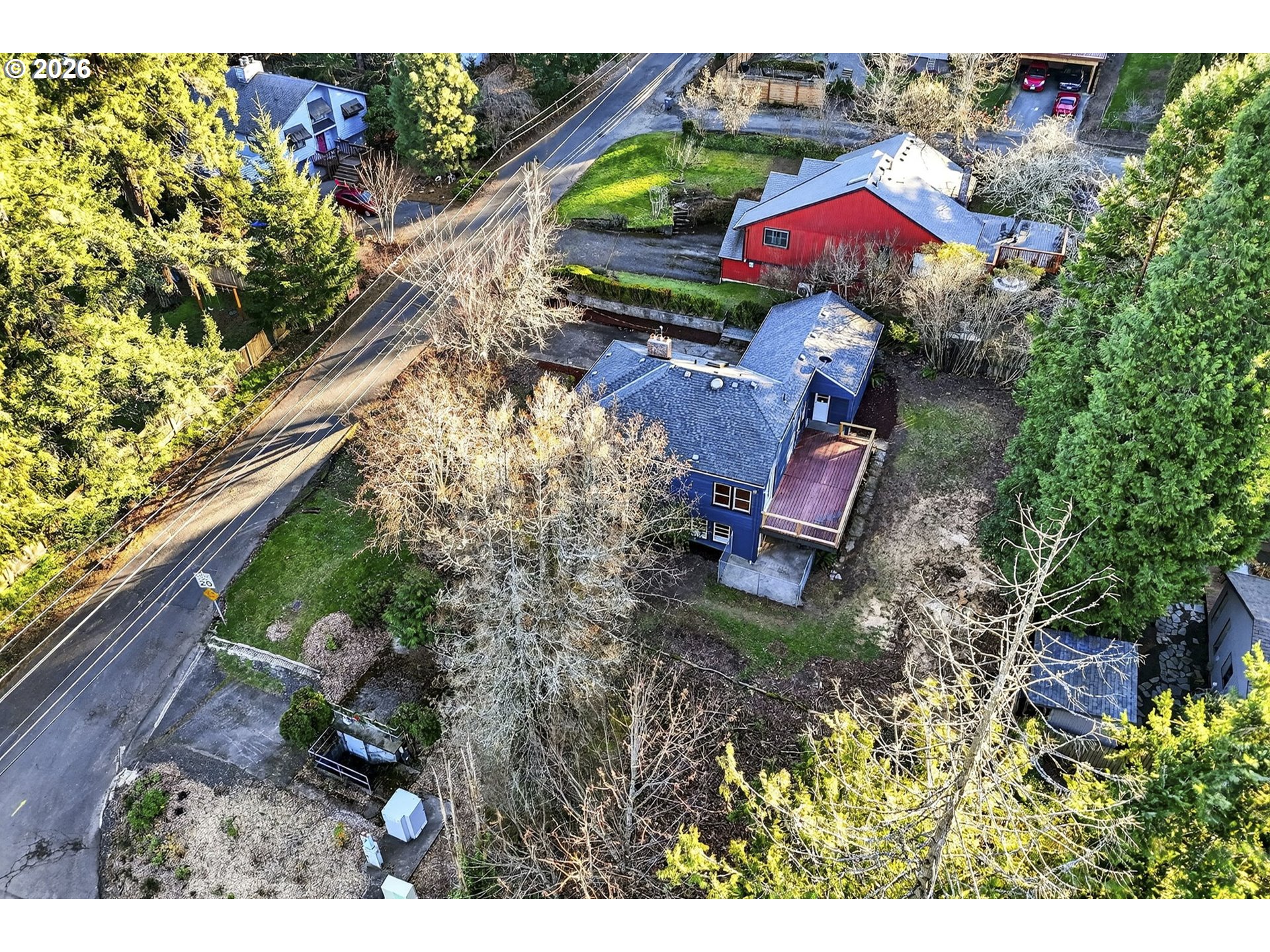 11811 Southwest 34th Avenue Portland, OR 97219 - Photo 36 of 39 a aerial view of a house with a yard and garden