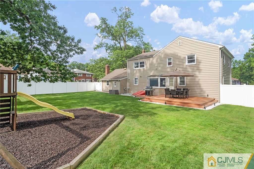 151 East Cliff Road Colonia, NJ 07067 - Photo 3 of 29 a view of a house with backyard