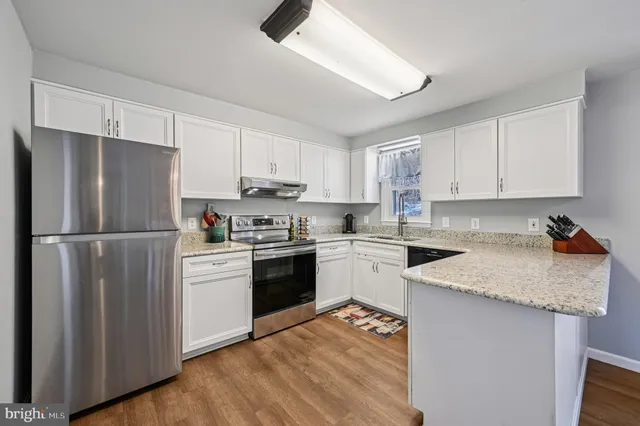 a view of a livingroom with a fireplace
