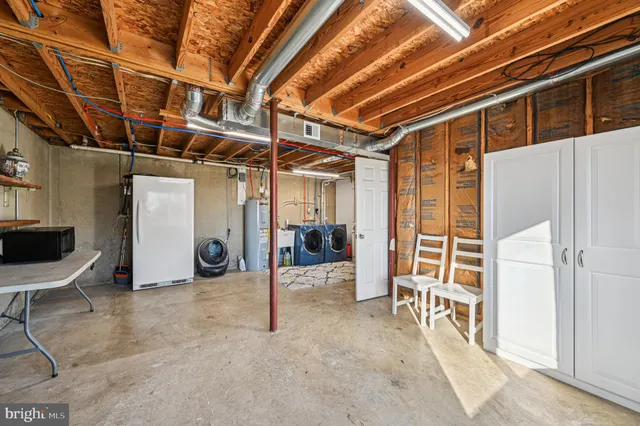 a backyard of a house with seating space