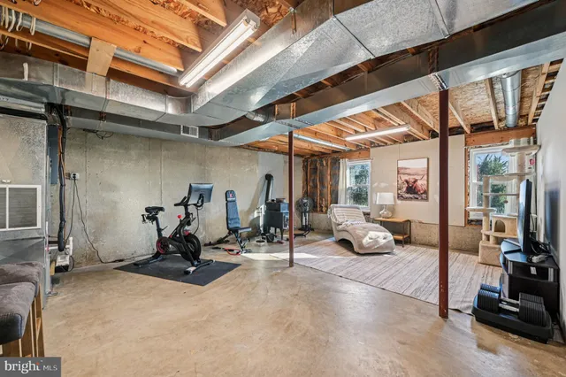 a swimming pool with trees in the background
