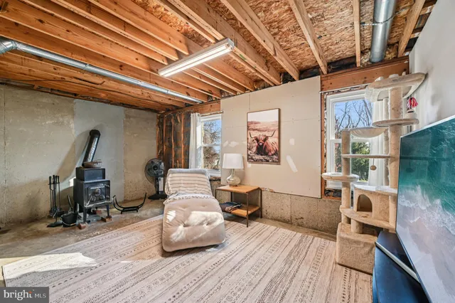 a swimming pool with outdoor seating and yard