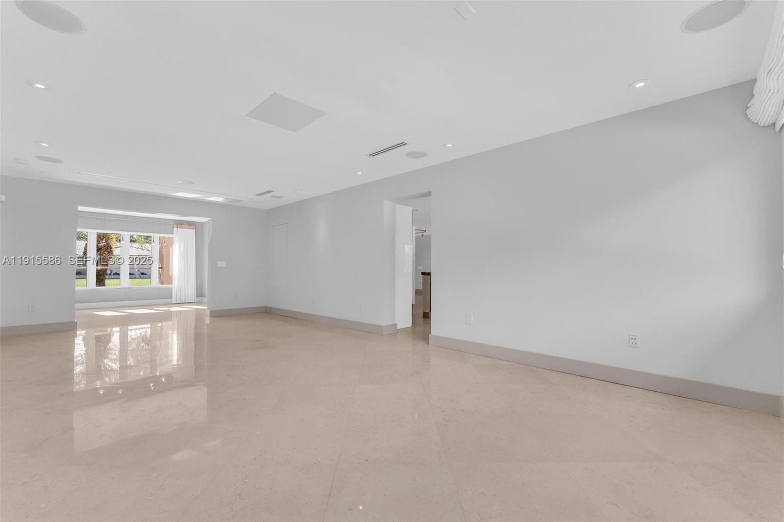 7261 West Troon Circle Miami Lakes, FL 33014 - Photo 23 of 61 a view of an empty room with a window