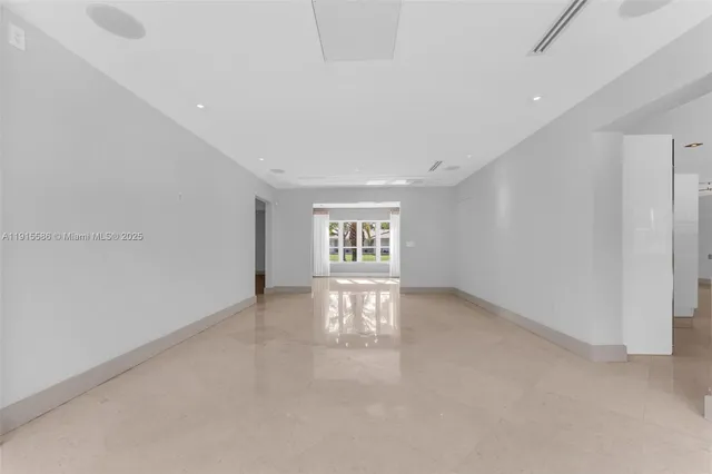 a bathroom with a shower and toilet
