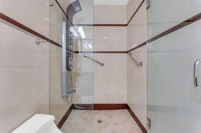 an aerial view of a house with garden space and lake view