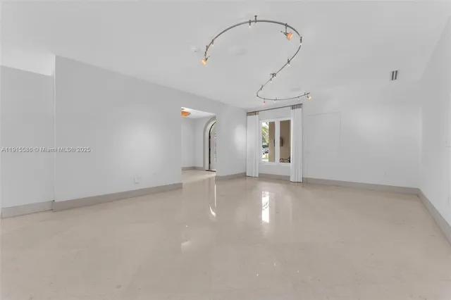a kitchen with a stove and cabinets