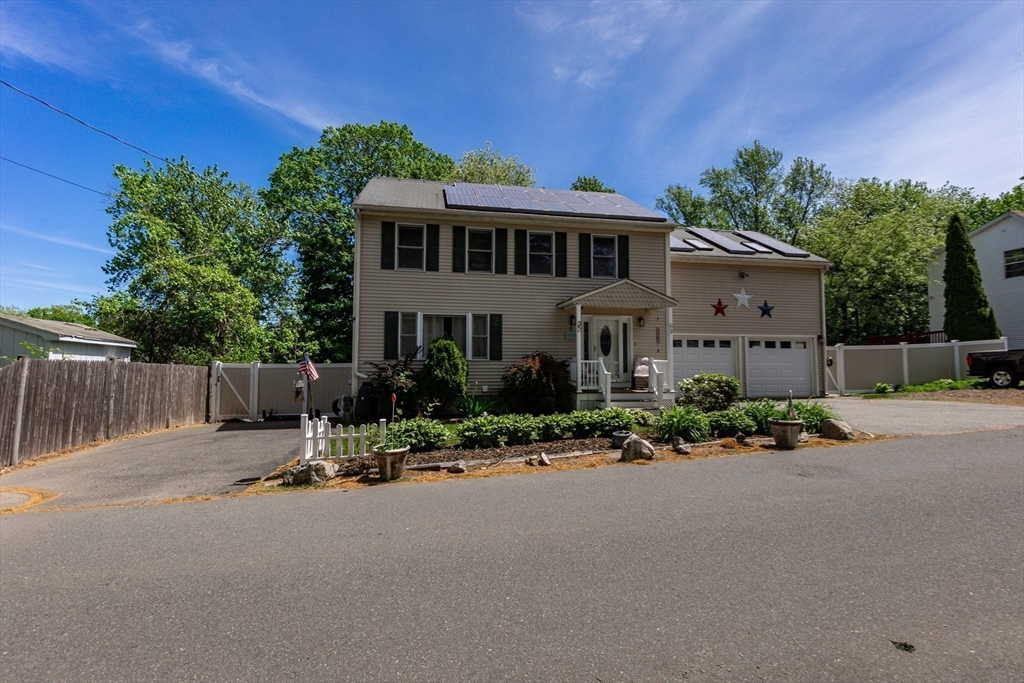 63 Bow Street Saugus, MA 01906 - Photo 42 of 42 front view of a house with a yard