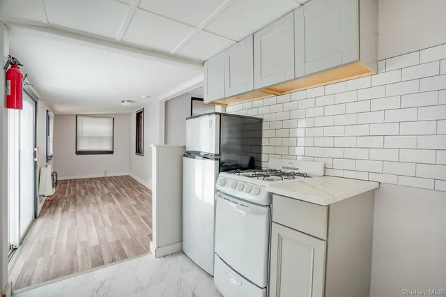 a storage room with washer and dryer