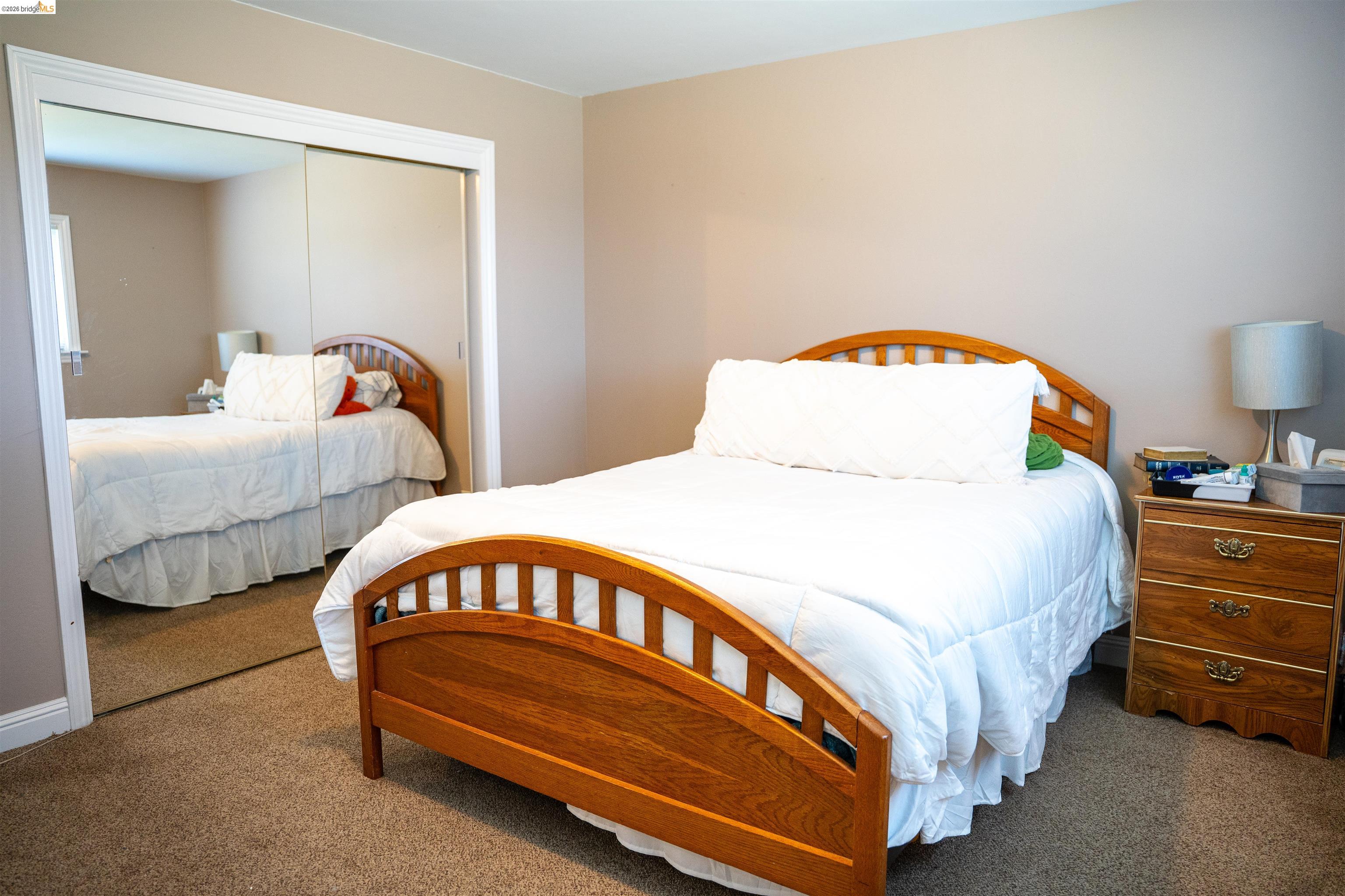 64 Washington Street Novato, CA 94947 - Photo 13 of 21 Bedroom featuring warm neutral wall tones and plush carpet flooring